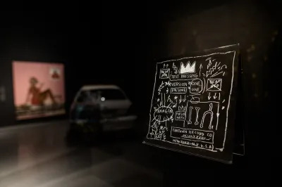 A black album cover showing a crown, phrases such as 