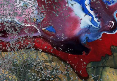 An abstract blend of blue, white, red, and more.