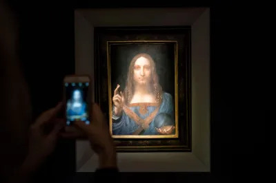 NEW YORK, NY - NOVEMBER 15: A visitor takes a photo of the painting 