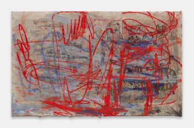 An abstract painting with blue and red scrawls over graffiti-like images.