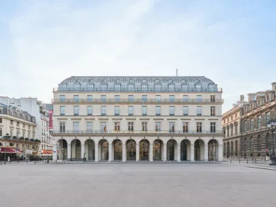 A department store on an empty plaza.